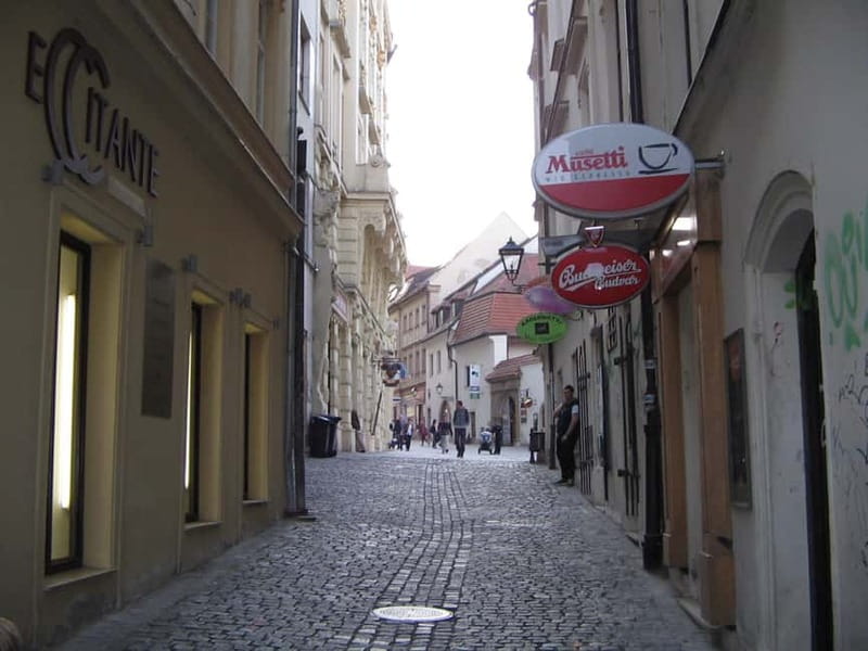 Brno: Historic Downtown Walking Tour - Old Town Hall legend: dragon and wheel