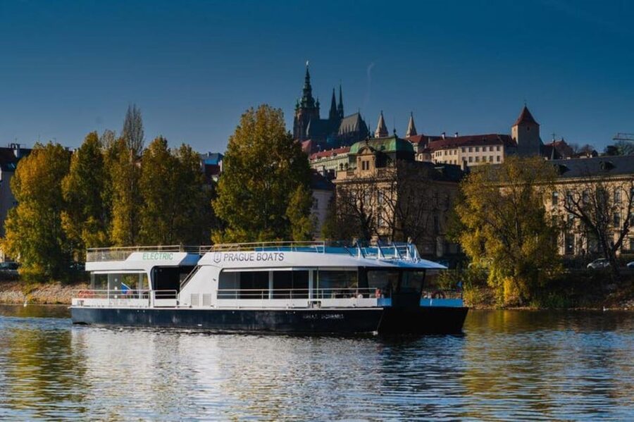 City Sightseeing Prague HOHO Bus, Castle Tour + River Cruise - Red Line: double-decker loop for the castle hills and Prague views