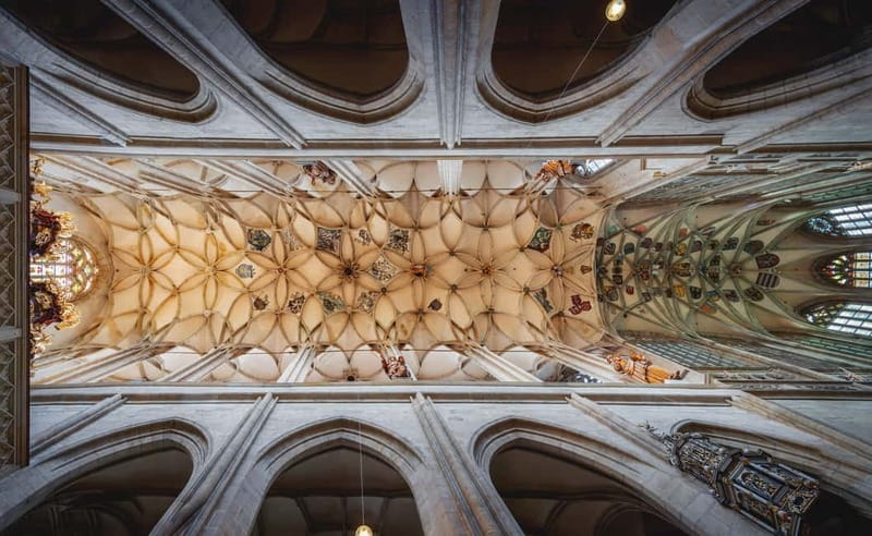 From Prague: Kutná Hora, Bone Church & Folk Village Day Tour - Sedlec Ossuary, the bones, the art, and the quieter timing