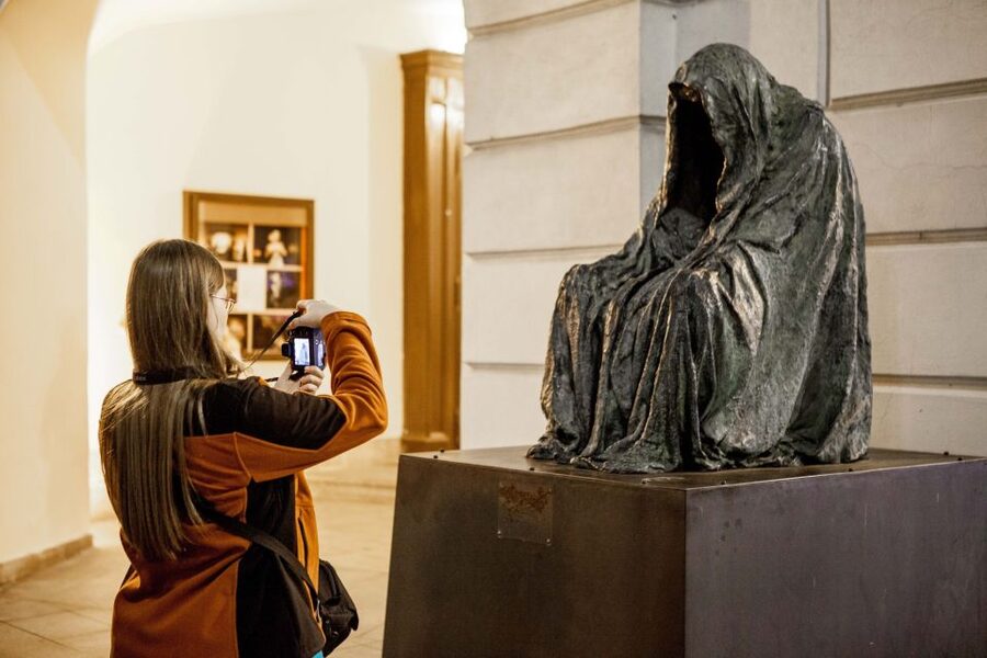 Ghost Walking Tour of Prague - Old Town Square after dark: Astronomical Clock, Old Town Hall, and peak atmosphere