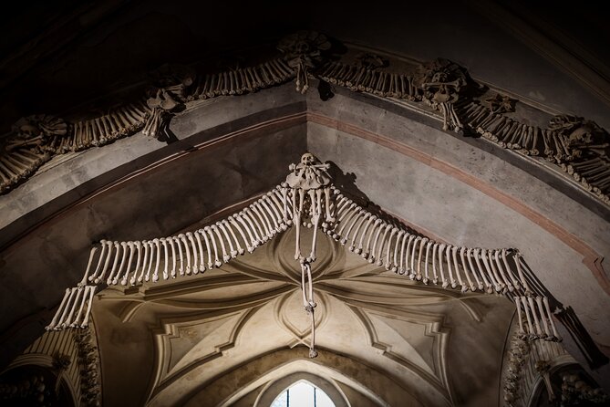 Kutná Hora, Bone Church and Folk Village Small Group Day Tour - Sedlec Ossuary: haunting art, strict photo rules, and respectful time