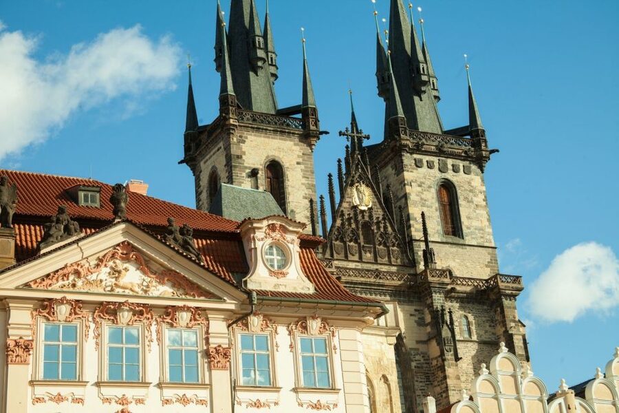Prague: 3-Hour Old Town and Prague Castle Tour in German - Clementinum and Charles Bridge, where the city tells you where to look