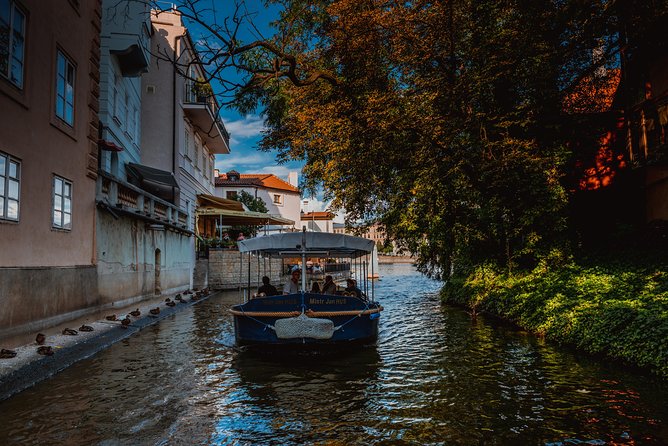 Prague Devil's Channel Cruise on Vltava River with Commentary - Small-boat comfort: glass windows, cold queues, and where to sit