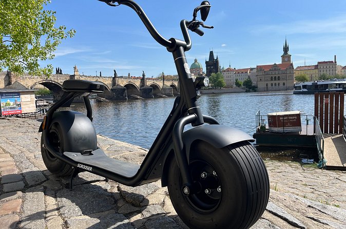 Prague Fat Tire E-Scooter Tour with A Local Guide - Price and value: $76.99 for a half-day of motion and context