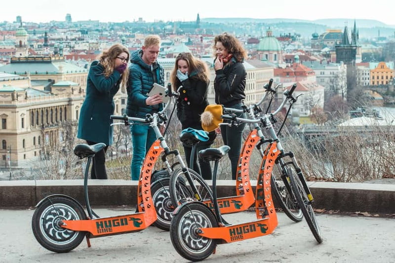 Prague: Fat Tire or Regular Scooter Tour with A Local Guide - Choosing between Hugo Bike and the SCROOSER fat-tire option