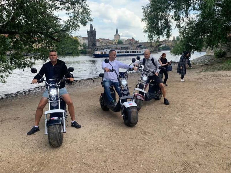 Prague: Guided Fat Tire e-Scooter Tour - Petrin Park descent, the narrowest street, and the Lennon Wall