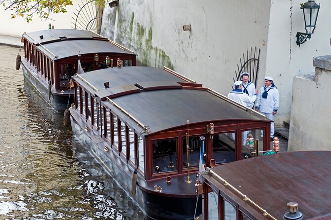 Prague Guided Walking Tour and Cruise with Authentic Czech Lunch - Taking the Tram Up to Prague Castle Grounds