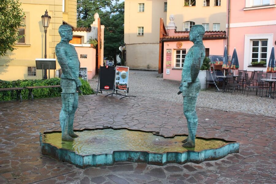 Prague: Hidden Gems Walking Tour with Local Guide - Charles Bridge Finish Energy: Views, Narrow Streets, and Photos