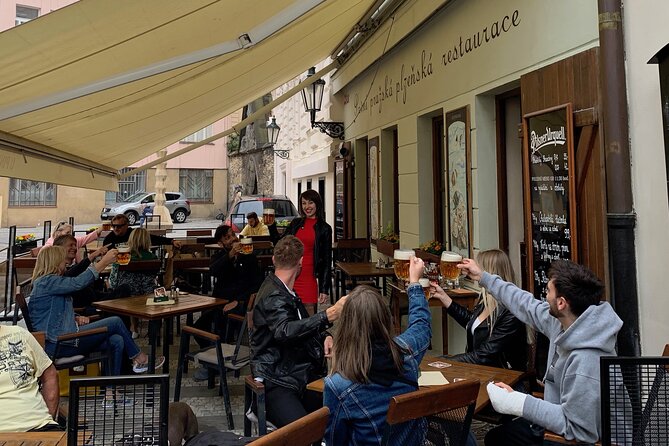 Prague Historic Pub Tour with Drinks Included - Stop 4: Charles Bridge approach, Jewish quarter sights, and photo-friendly moments