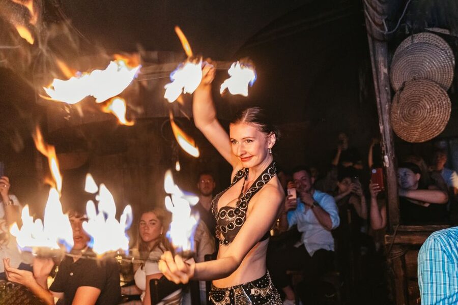 Prague: Medieval Dinner with Unlimited Drinks - Seating, sharing tables, and comfort in a busy venue
