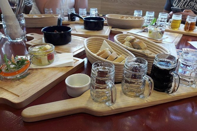 Prague Mini-Breweries Beer Tour with Czech Appetizers - Loď Pivovar finish: unlimited pours and Czech appetizers