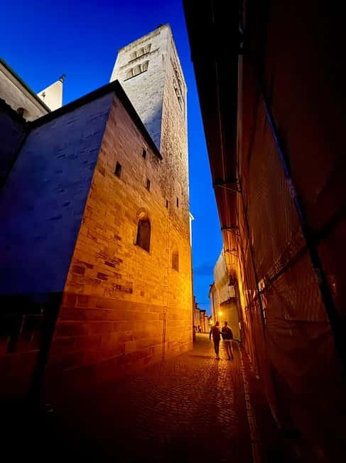 Prague: Night Walk through Prague Castle with City Views - Hradčany Square at Night: Prague’s Tower View Like a Planet