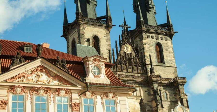 Prague: Old Town and Jewish Quarter Guided Tour in German - Charles University to the Jewish Quarter, where the walk turns personal