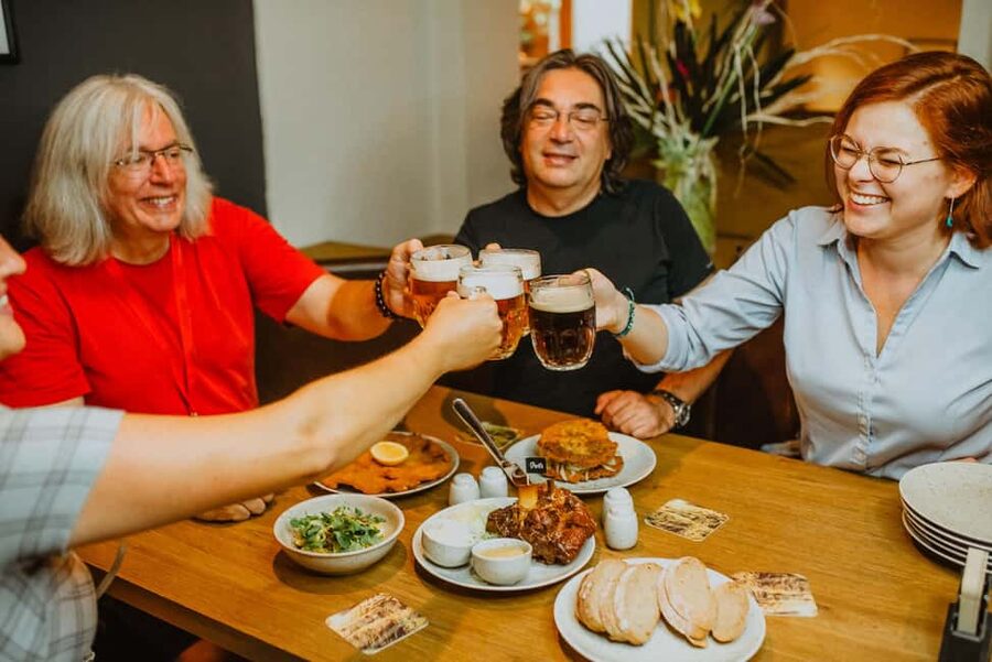 Prague: Old Town Fun Evening Food and Drink Tour - Another sit-down stop, plus a calm walk toward the finale