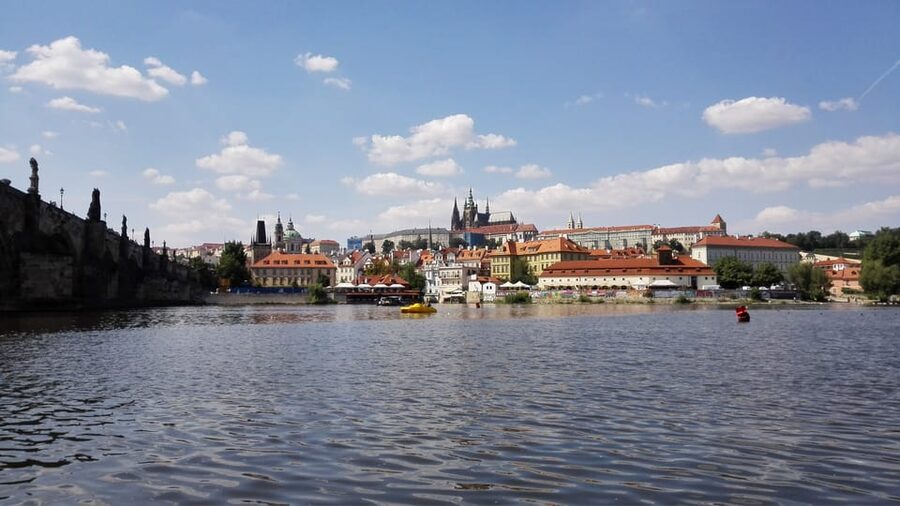 Prague: Old Town Guided Walking Tour and City Boat Ride - The Vltava Boat Ride Under Charles Bridge, Plus Headset Stories in 20 Languages