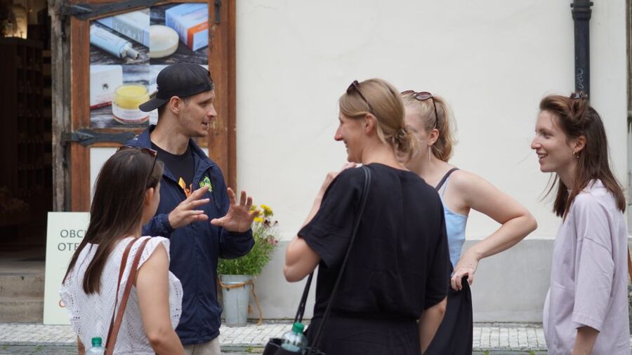 Prague: One Prague Tour with Local Food & Beer - The walking, cobblestones, and rain gear you should plan for