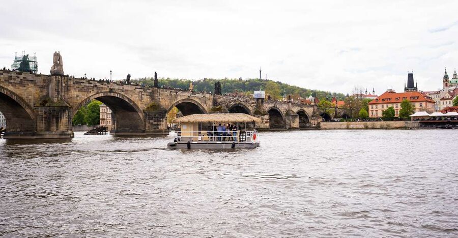 Prague: Party Tiki Boat Sightseeing Cruise with Drinks - What 90 minutes on the Vltava feels like