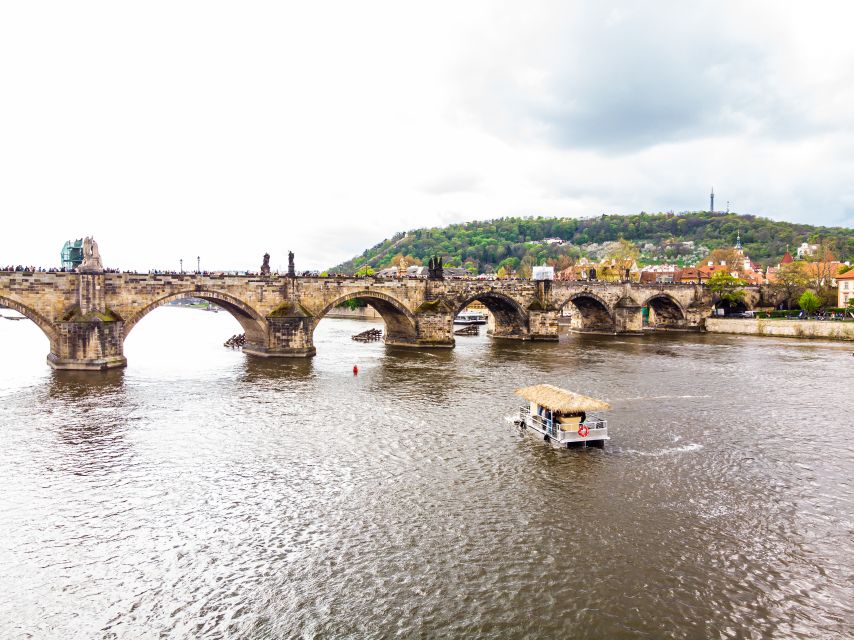 Prague: Party Tiki Boat Sightseeing Cruise with Drinks - Landmarks on the route: National Theatre, Charles Bridge, and Štvanice Island