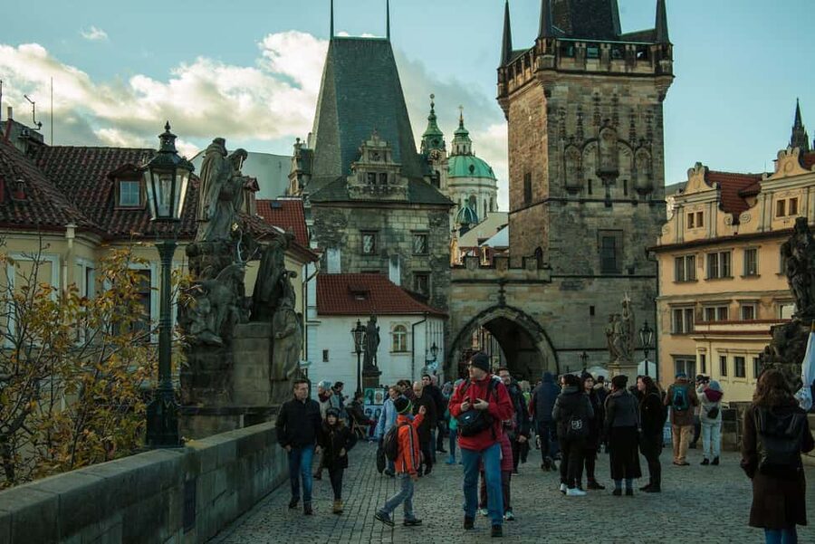 Prague: Prague Castle Walking Tour with Golden Lane in German - Tram ride up to the Castle: saved energy, better views