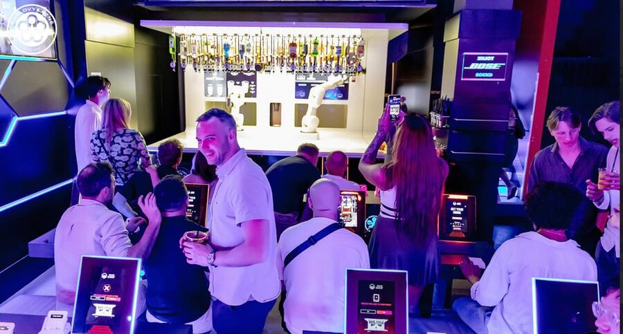 Prague: Robotic Bar Entry with a Drink Included - Robot bartenders, from ceiling bottles to two-arm assembly