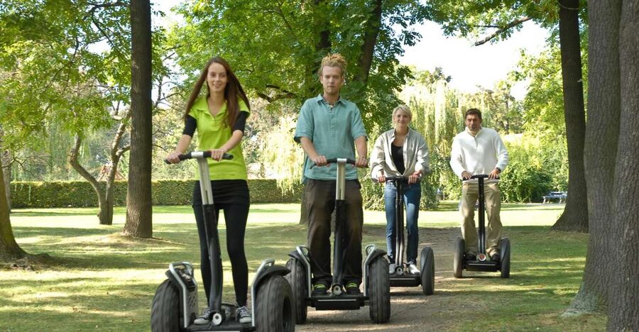 Prague: Segway Sightseeing Live-Guided Tour - Entering The Segway Rhythm: Training, Helmet, and Confidence