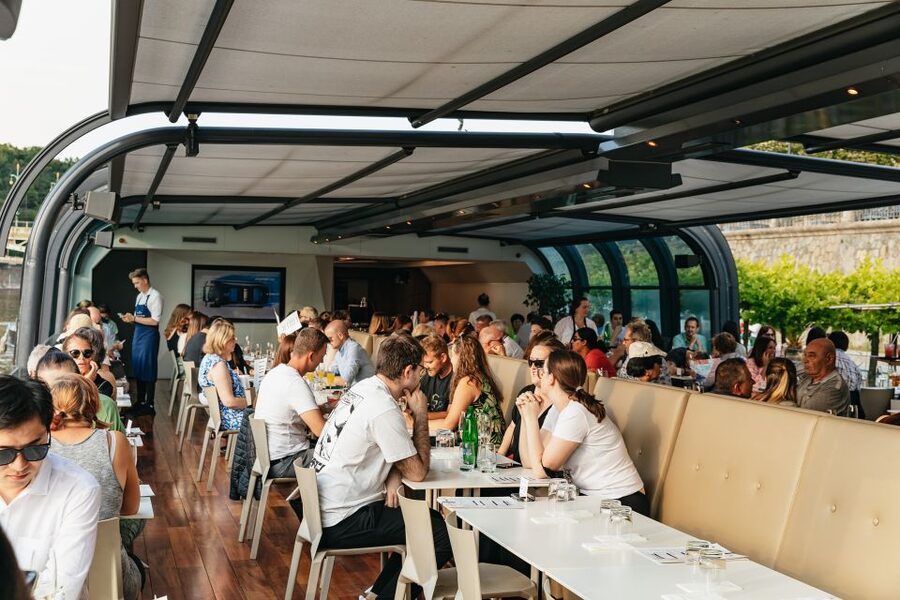 Prague: Sightseeing Dinner Cruise on Open-Top Glass Boat - The glass boat setup, noise control, and why it helps your photos