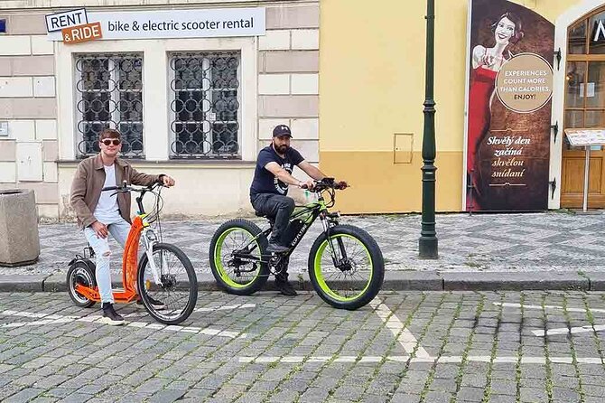 Prague Trike & e-Scooter Tour: Castle Viewpoints & Charles Bridge - Kafka and the playful stop you’ll remember