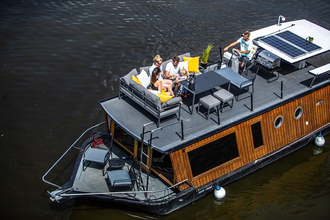 Prague YachtBoat CLASSIC cruise with Unlimited Beer or Prosecco - Step aboard at Náplavka, then watch the river take over