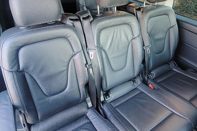 Private Transfer in Mercedes V-Class Minivan - How Flight Tracking and the Name Sign Save You Time