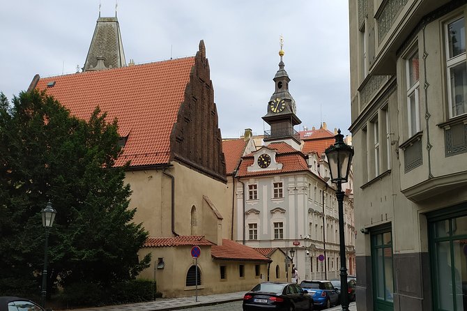 Religious Prague Walking Tour - Stop 4: St. Michael Church Prague and St. Nicolas, Two Important Stops in One Window