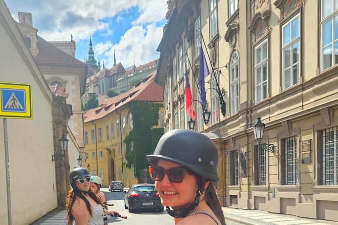 The Highlights of Prague on eBike or electric Scooter - Starting at Maltézské náměstí: meet, gear up, and test your balance