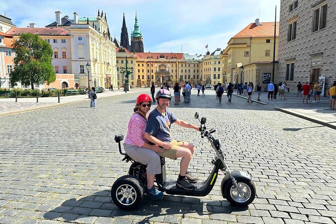 The Highlights of Prague on eBike or electric Scooter - Charles Bridge and the old city energy: priceless views, short stay
